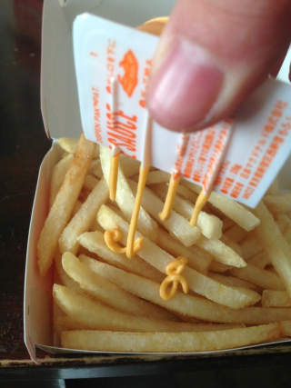 Illustration for article titled In Japan, McDonald's Just Released Disgusting-Looking Cheese Fries